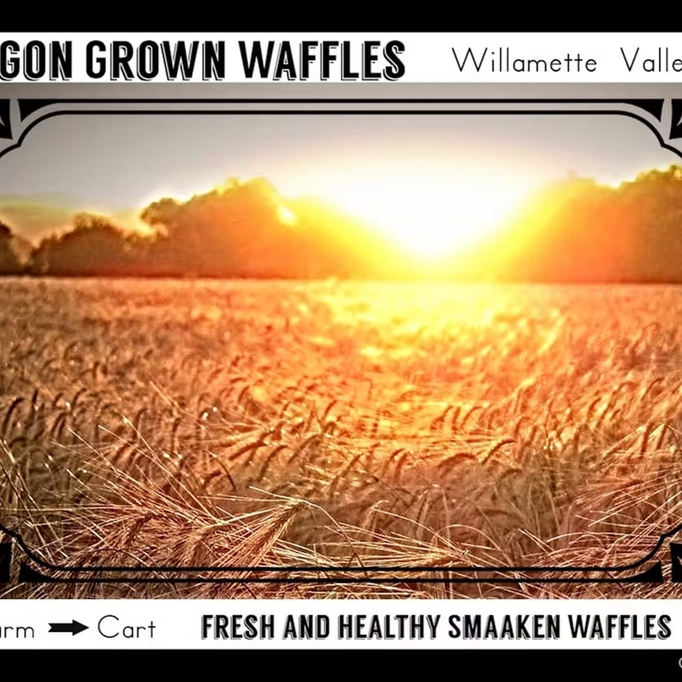Golden wheat field at sunset, with text "Oregon Grown Waffles" and "Fresh and Healthy Smaaken Waffles".